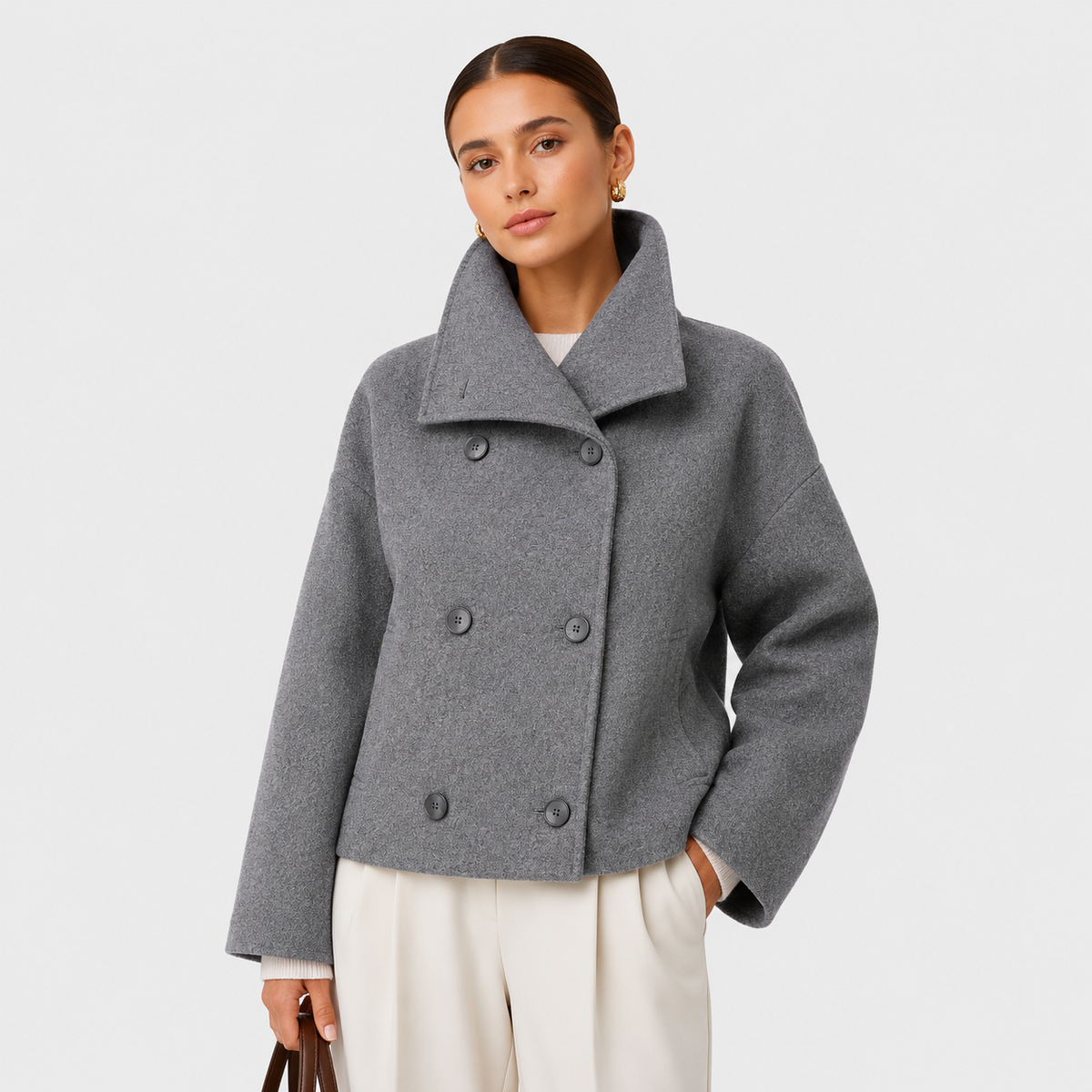 Veste élégante pour femme, style classique et raffiné. 0